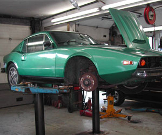 74 Saab Sonett 97 on the hoist at Van's Garage